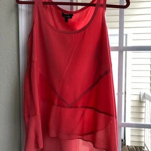 Bebe Brand: Sleeveless blouse with a scoop back